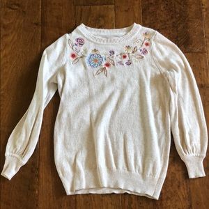LOFT cream sweater with embroidery details.